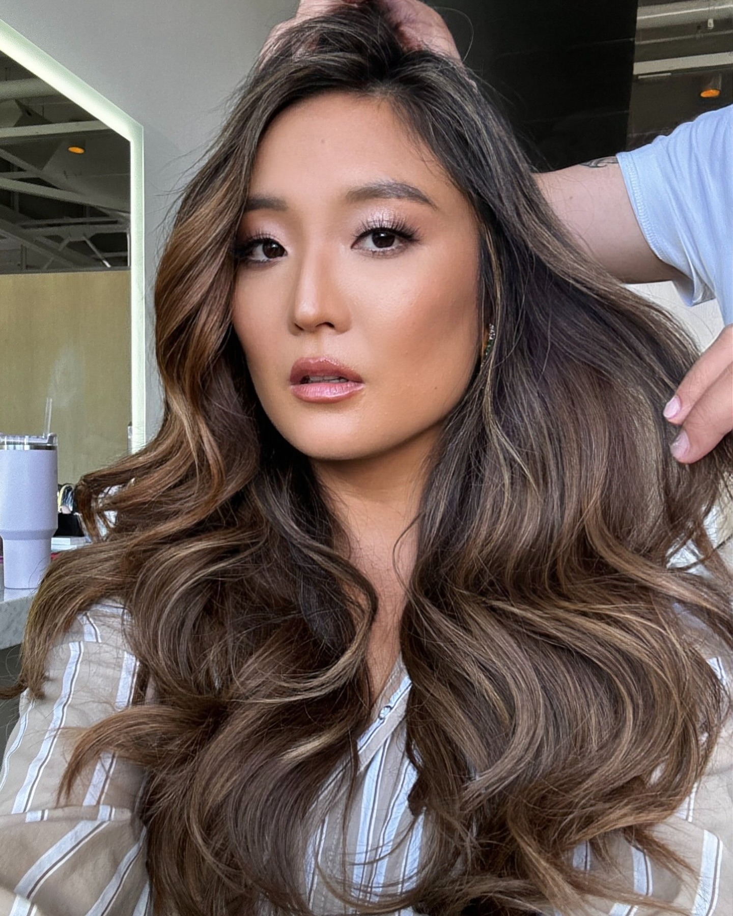 Photo of Ashley Park with romantic waves