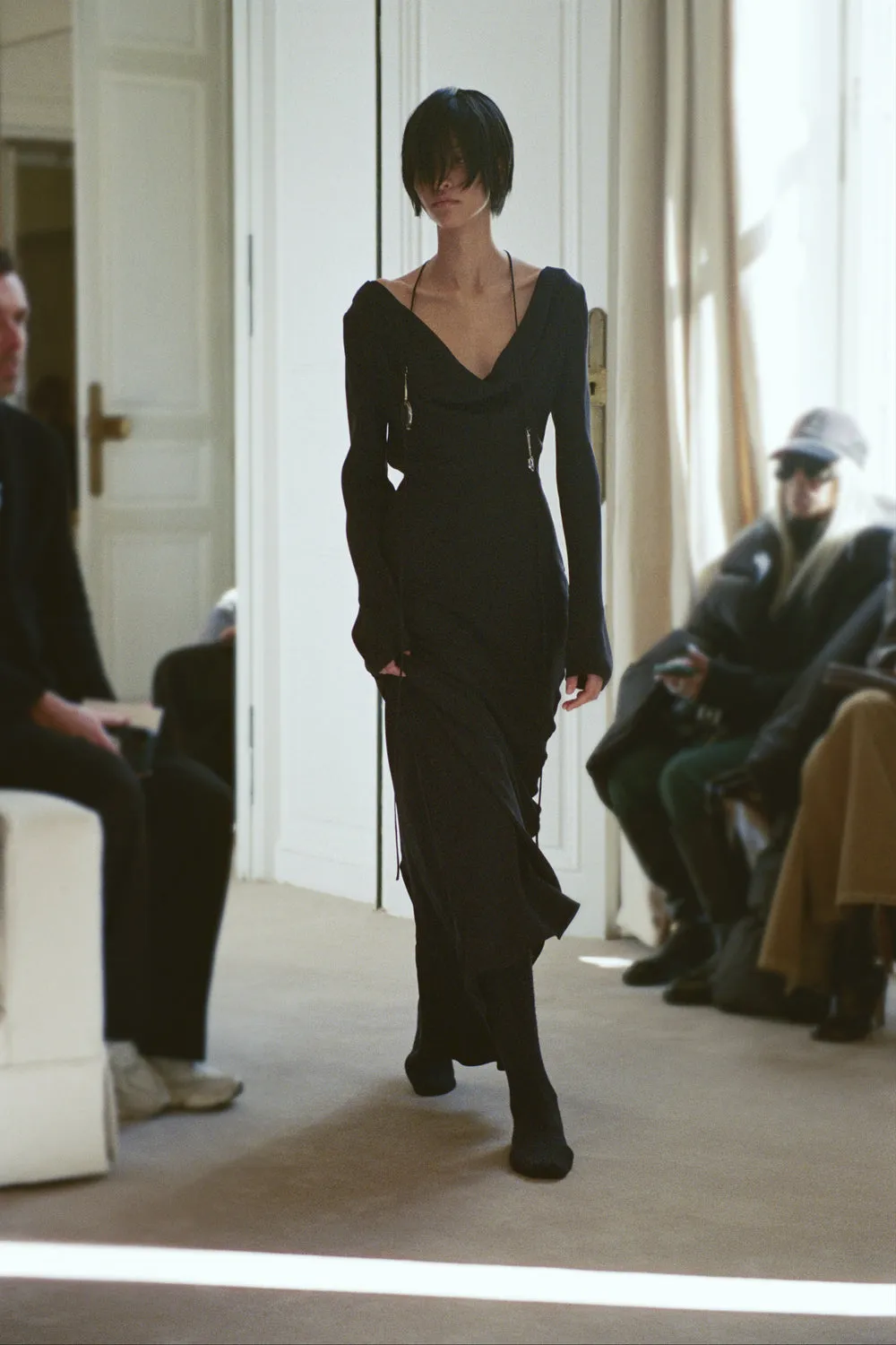 A model during the row winter 2025 show wears cashmere tights.