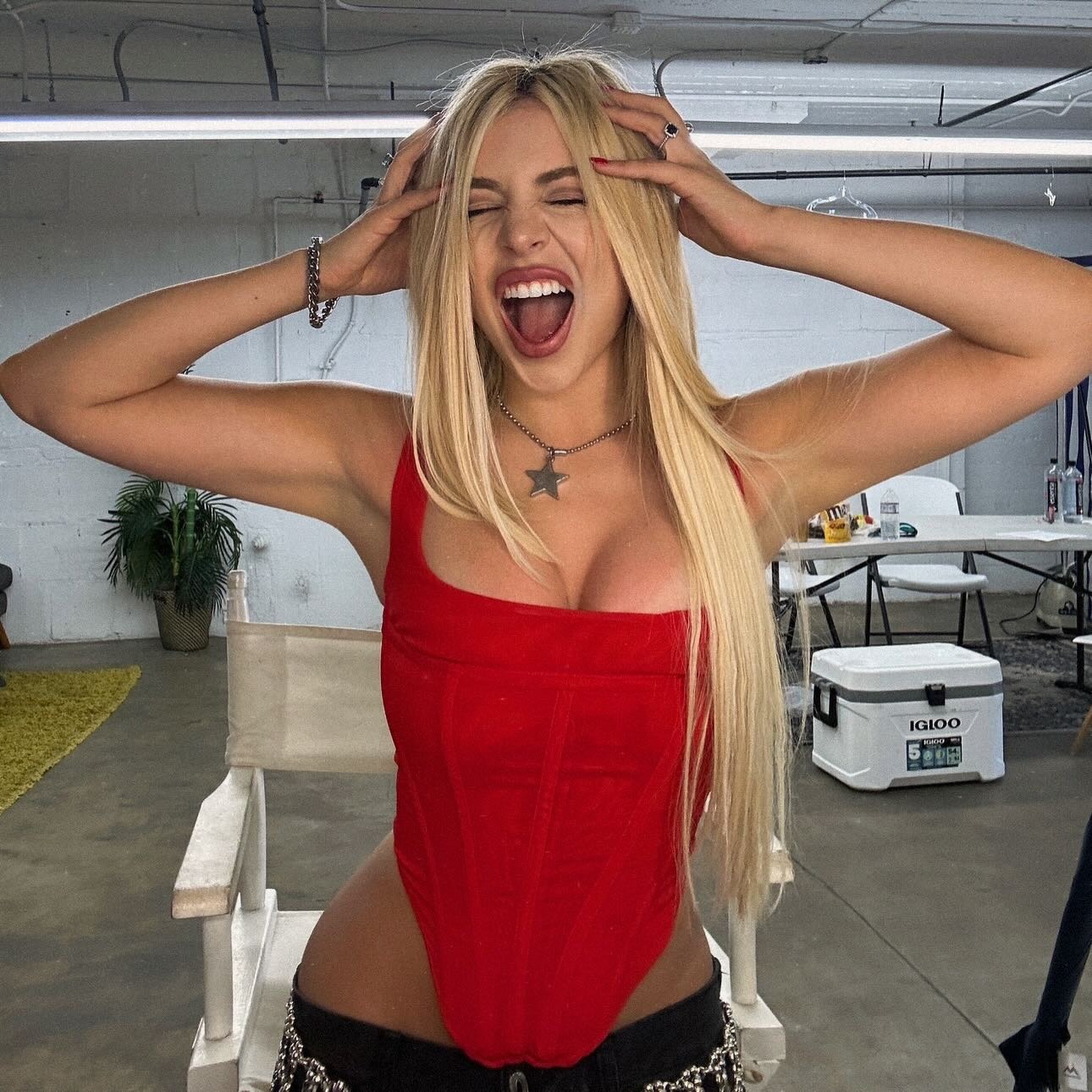 Ava Max with asymmetrical hair.