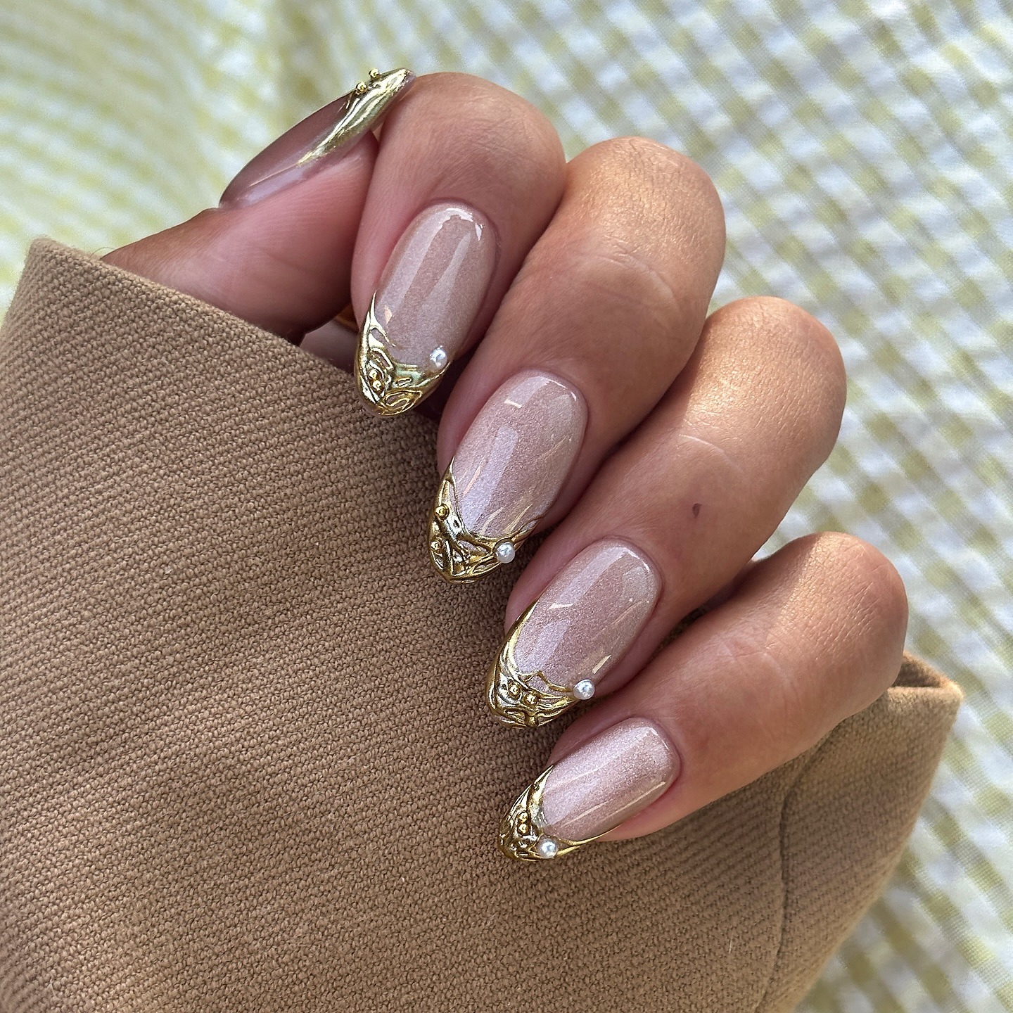 Velvet nails with gold French manciure.