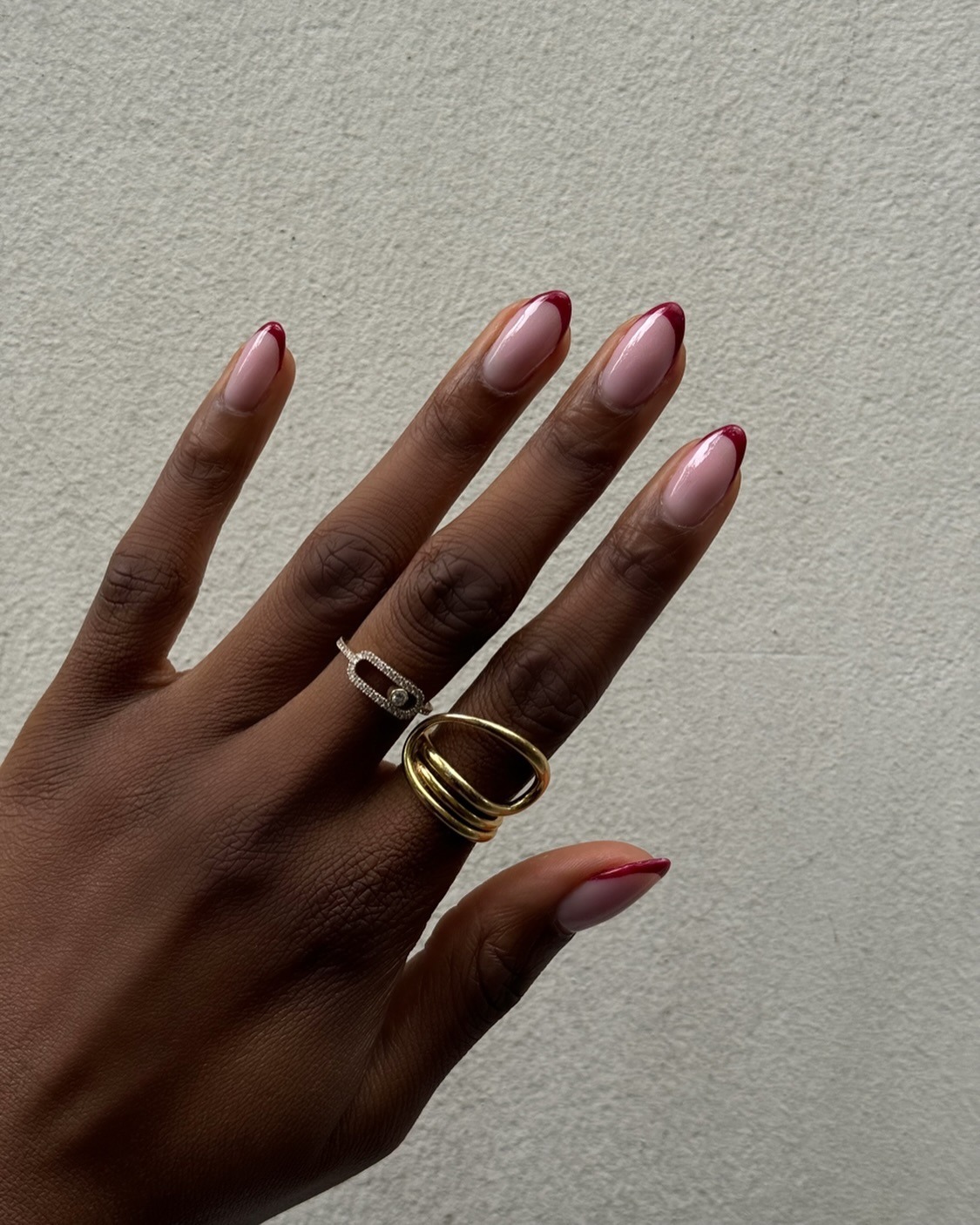 A French manicure with red tips.
