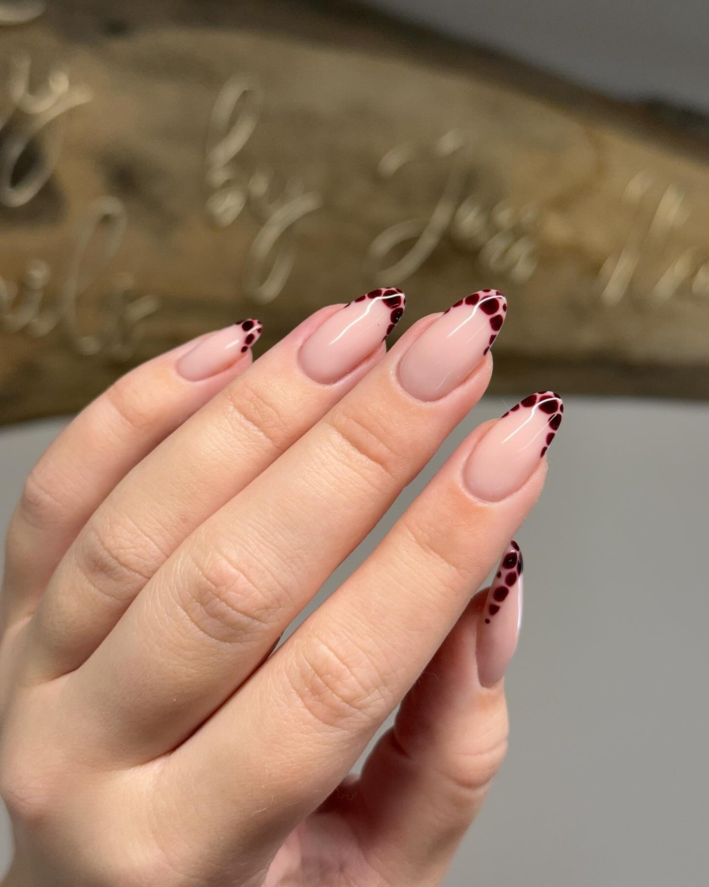 Photo of a dark purple French nail design