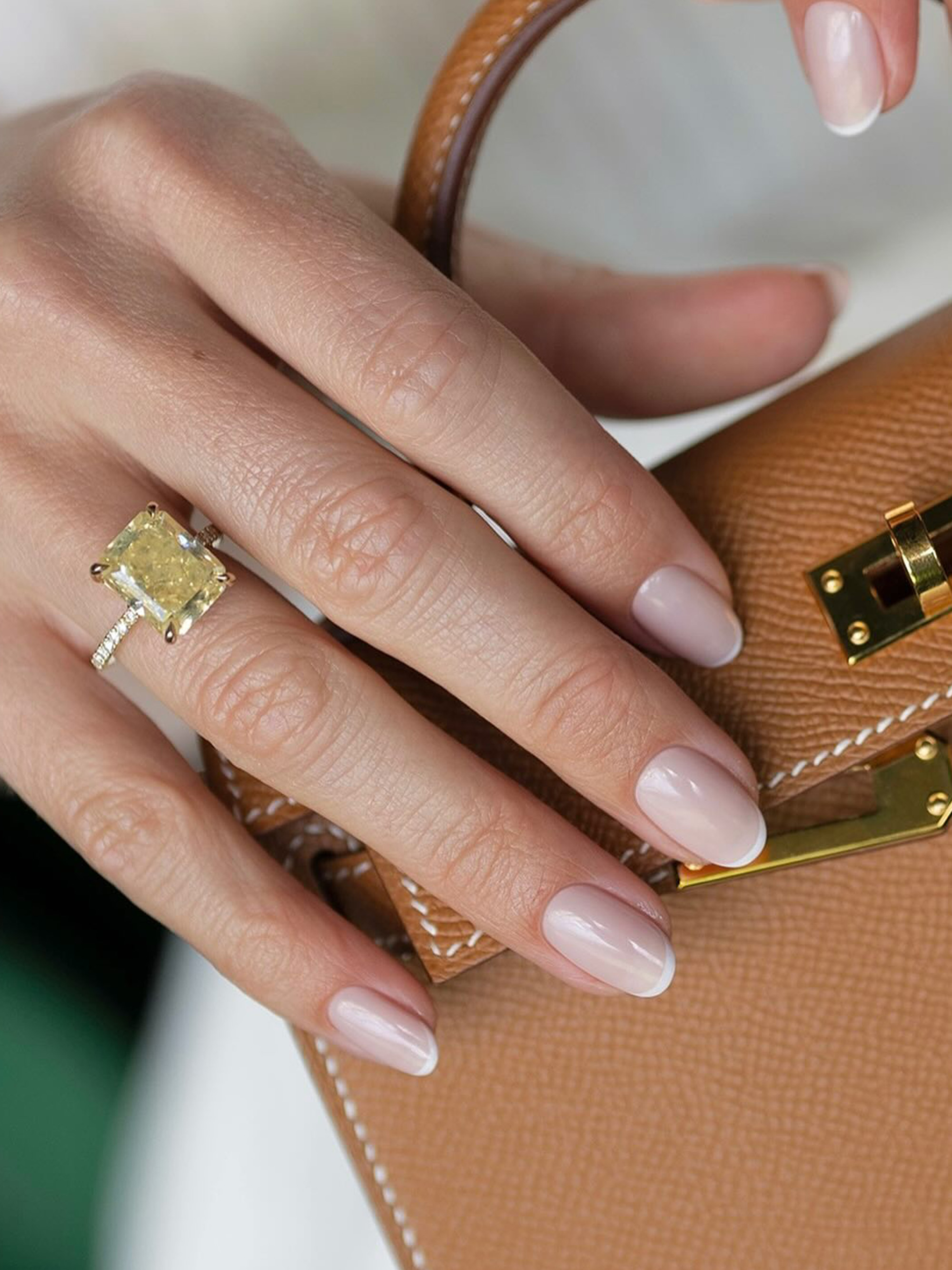 An oval French manicure by Georgia Rae.