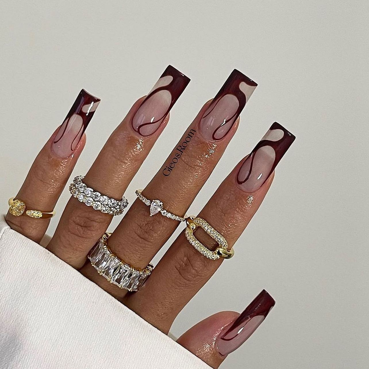 Photo of a dark purple French nail design