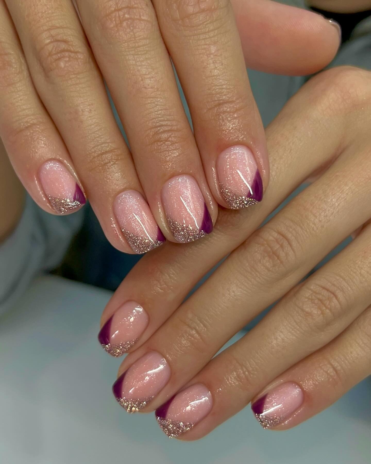 Photo of a dark purple French nail design