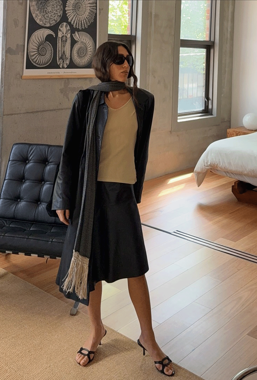 Camelia Farhoodi wearing oversize sunglasses.