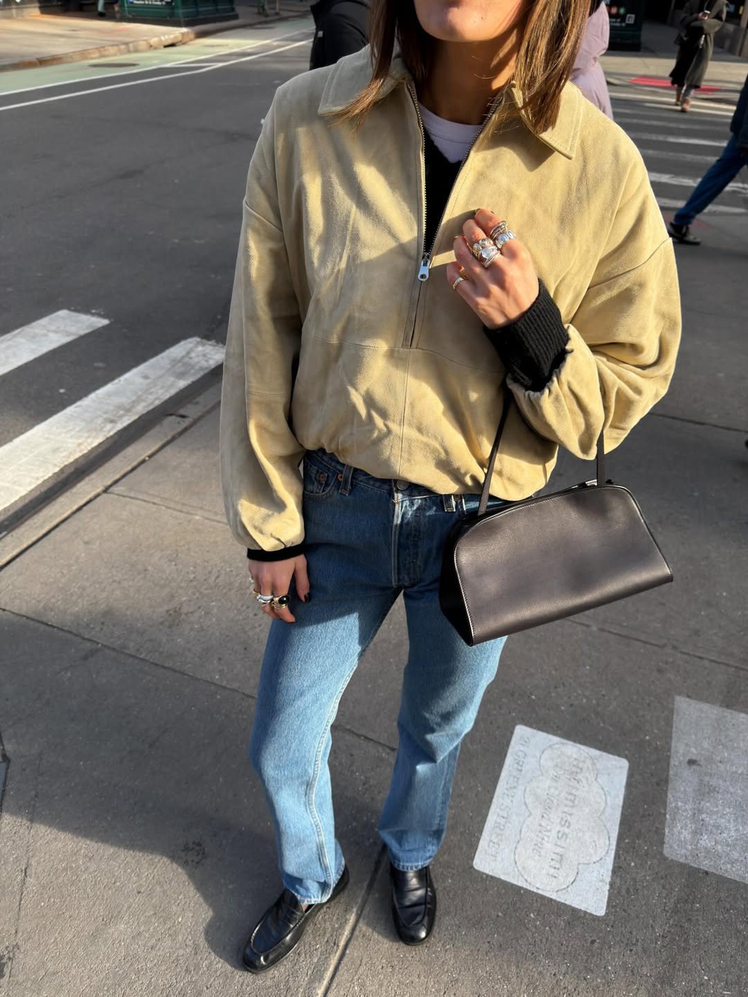 Coco Schiffer carrying The Row Peggy Clutch
