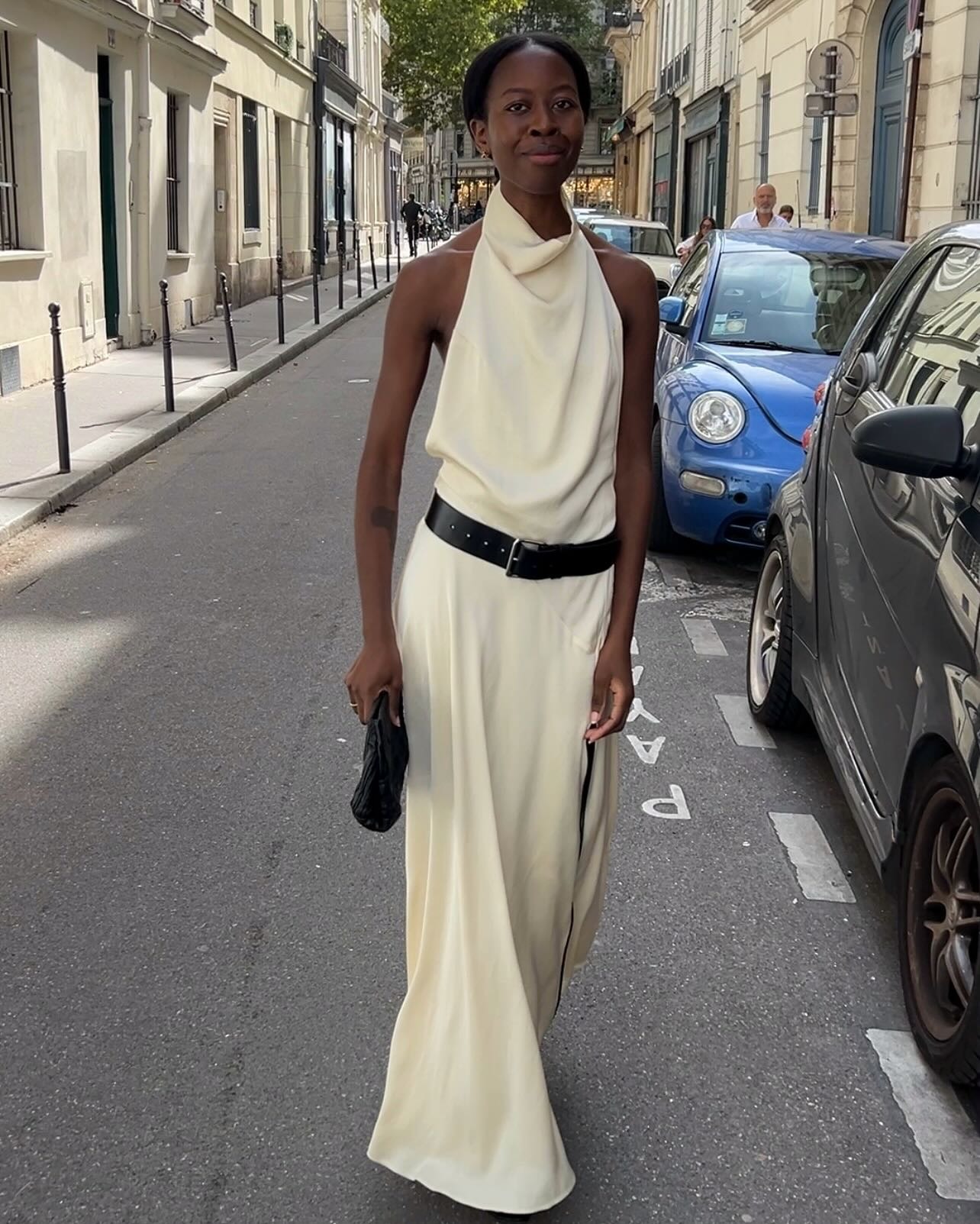 @sylviemus_ in a high neck dress